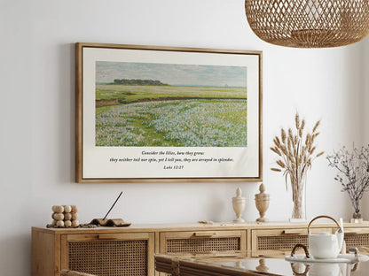 Invite the gentle reminder of God's perfect care into your home with this inspiring Christian wall art. This framed print features a beautiful field painting paired with the comforting teaching from Luke 12:27: "Consider the lilies, how they grow..."