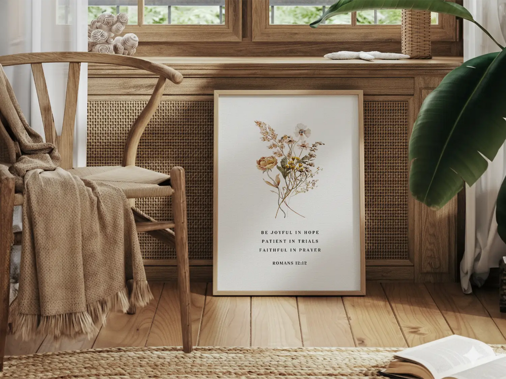 Anchor your heart in hope and resilience with this inspiring Christian canvas wall art. This framed canvas print features a beautiful pressed floral illustration paired with the powerful encouragement from Romans 12:12 to be joyful, patient, and faithful.