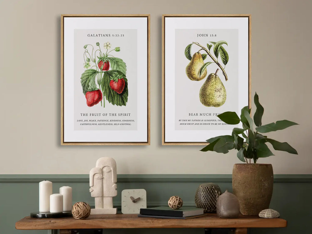 Decorate your home with this beautiful Christian wall art set. This collection of two framed botanical prints features detailed illustrations of fruit, paired with powerful verses on the Fruit of the Spirit and bearing spiritual fruit.