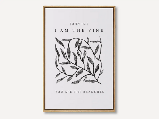 Anchor your home in the source of life and fruitfulness with this inspiring Christian canvas wall art. This framed canvas print features a modern, hand-drawn vine illustration and the essential truth from John 15:5: "I am the vine; you are the branches."