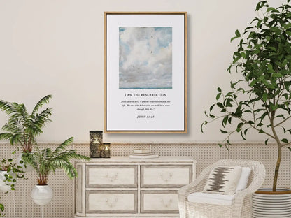 Anchor your hope in eternity with this inspiring Christian canvas wall art. This framed canvas print features a serene sky painting paired with the powerful declaration from John 11:25: "I am the resurrection and the life."
