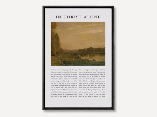 Anchor your life and hope in the solid ground of Christ with this inspiring Christian canvas wall art. This framed canvas print features the powerful, modern lyrics of "In Christ Alone," paired with a calming landscape painting.