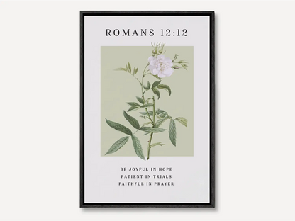 Anchor your heart in hope and resilience with this inspiring Christian canvas wall art. This framed canvas print features a calming botanical illustration paired with the powerful encouragement from Romans 12:12 to be joyful, patient, and faithful.