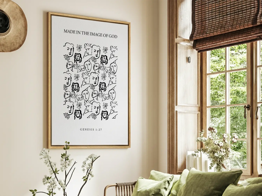 Modern Christian wall art displaying Genesis 1:27 in a living room