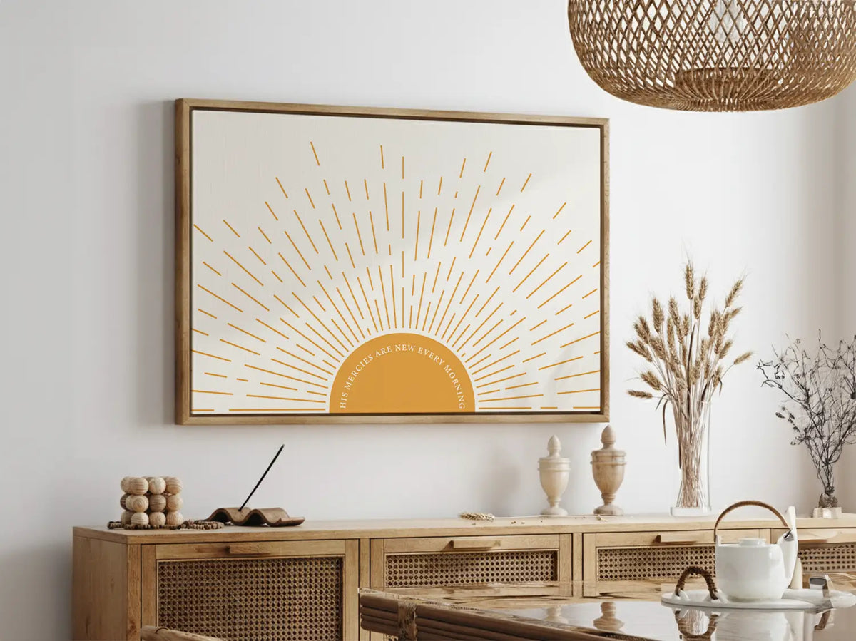 Start each day with hope and grace with this inspiring Christian canvas wall art. This framed canvas print features a bright, modern sunrise design and the comforting promise from Lamentations 3:23: "His mercies are new every morning."