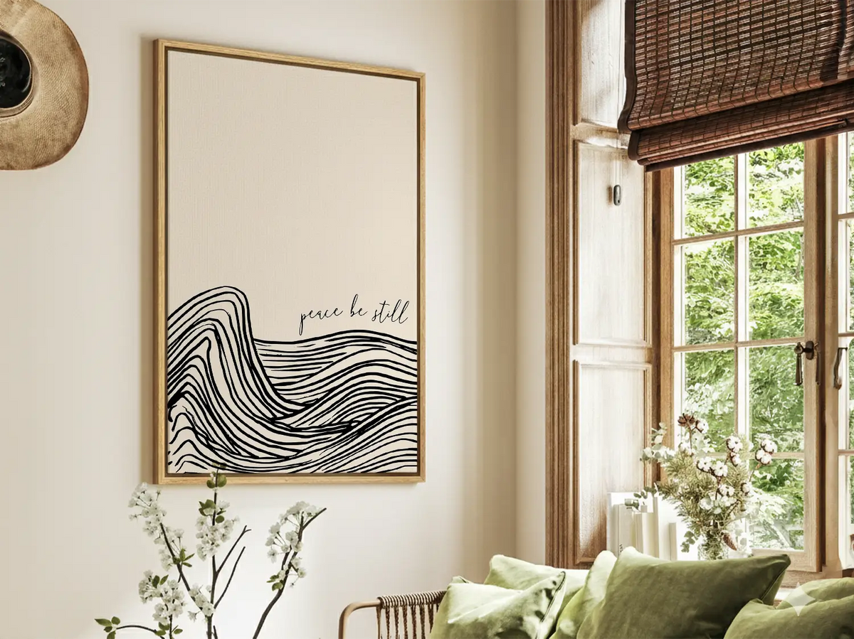 Minimalist Christian wall art “peace be still” in modern living room