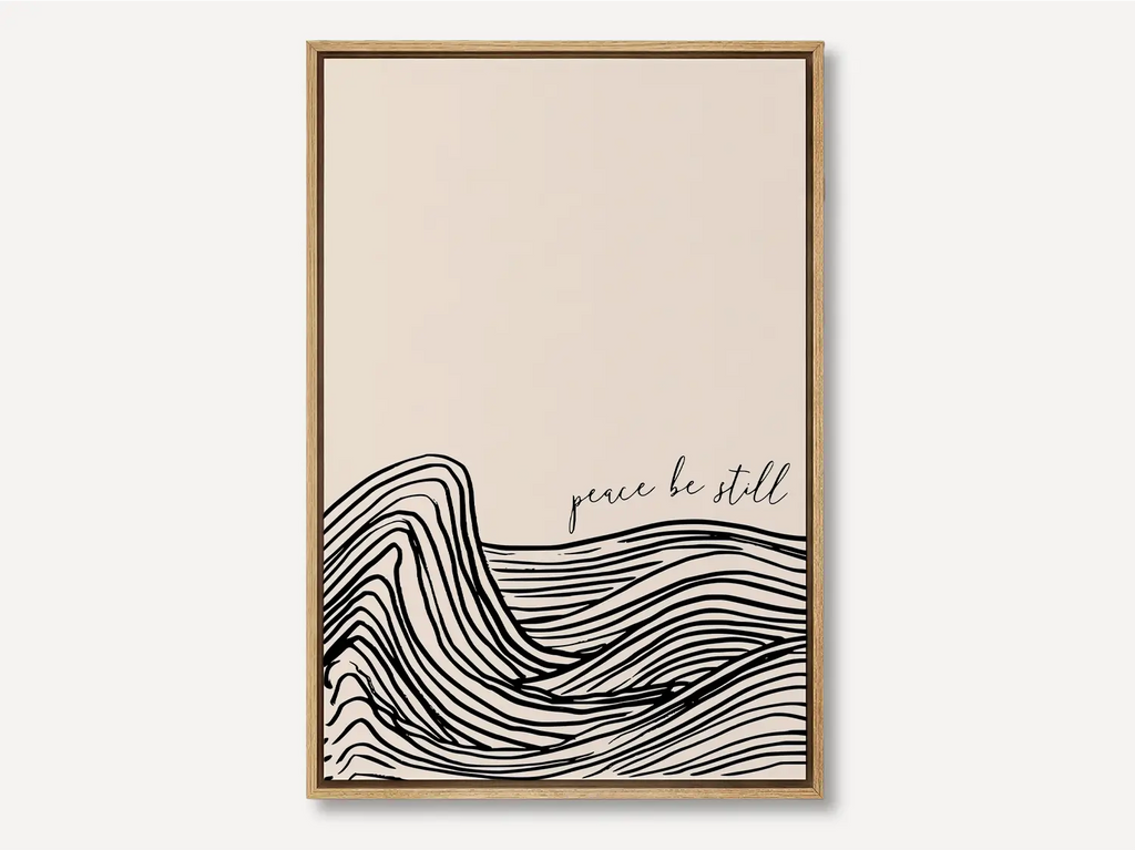 Minimalist Christian canvas wall art with abstract wave lines and the phrase “peace be still” on a neutral background