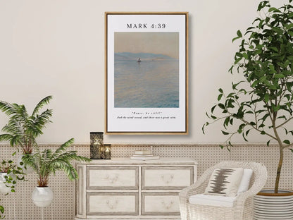 Invite the powerful peace of Christ into your home with this inspiring Christian canvas wall art. This framed canvas print features a calming seascape painting paired with the iconic command from Mark 4:39 that brought about a "great calm."