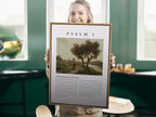 Anchor your life in true blessedness with this inspiring Christian canvas wall art. This framed canvas print features a peaceful landscape painting paired with the complete, foundational text of Psalm 1, the definition of a righteous life.