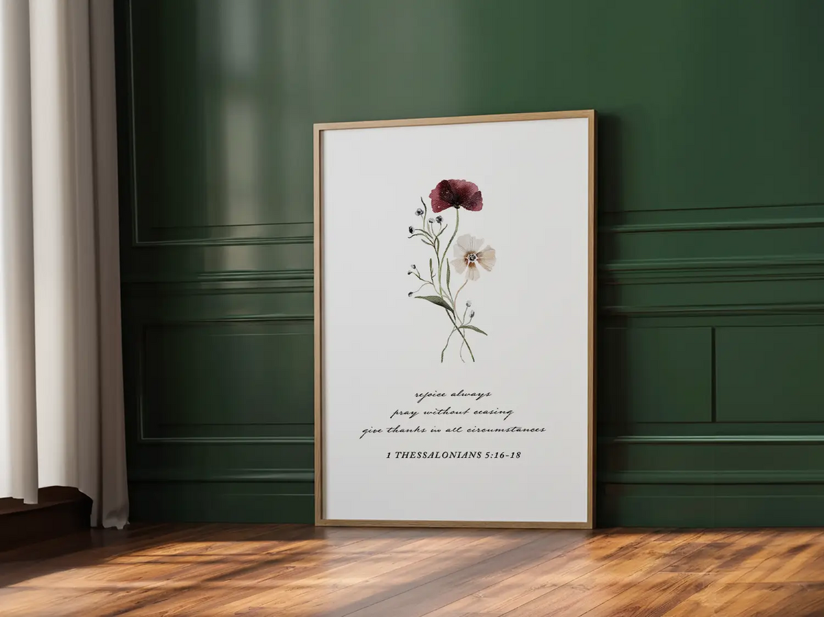 Anchor your heart in daily joy and gratitude with this inspiring Christian canvas wall art. This framed canvas print features a delicate watercolor floral illustration paired with the essential life commands from 1 Thessalonians 5:16-18.
