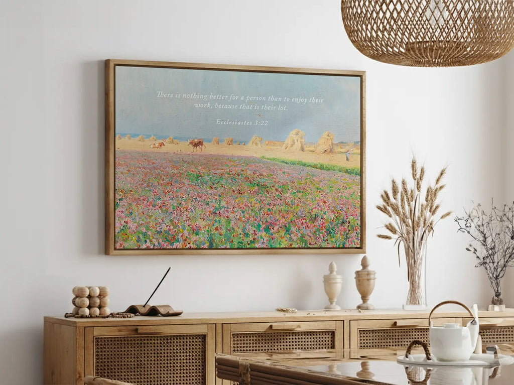 Celebrate the blessing of daily life with this inspiring Christian wall art. This framed print features a vibrant, pastoral field painting paired with the ancient wisdom from Ecclesiastes 3:22 about enjoying the work God has given you.