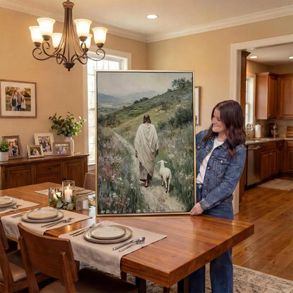 Following the Shepherd Christian canvas art showing Jesus leading a lamb