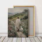 Following the Shepherd Christian canvas art showing Jesus leading a lamb