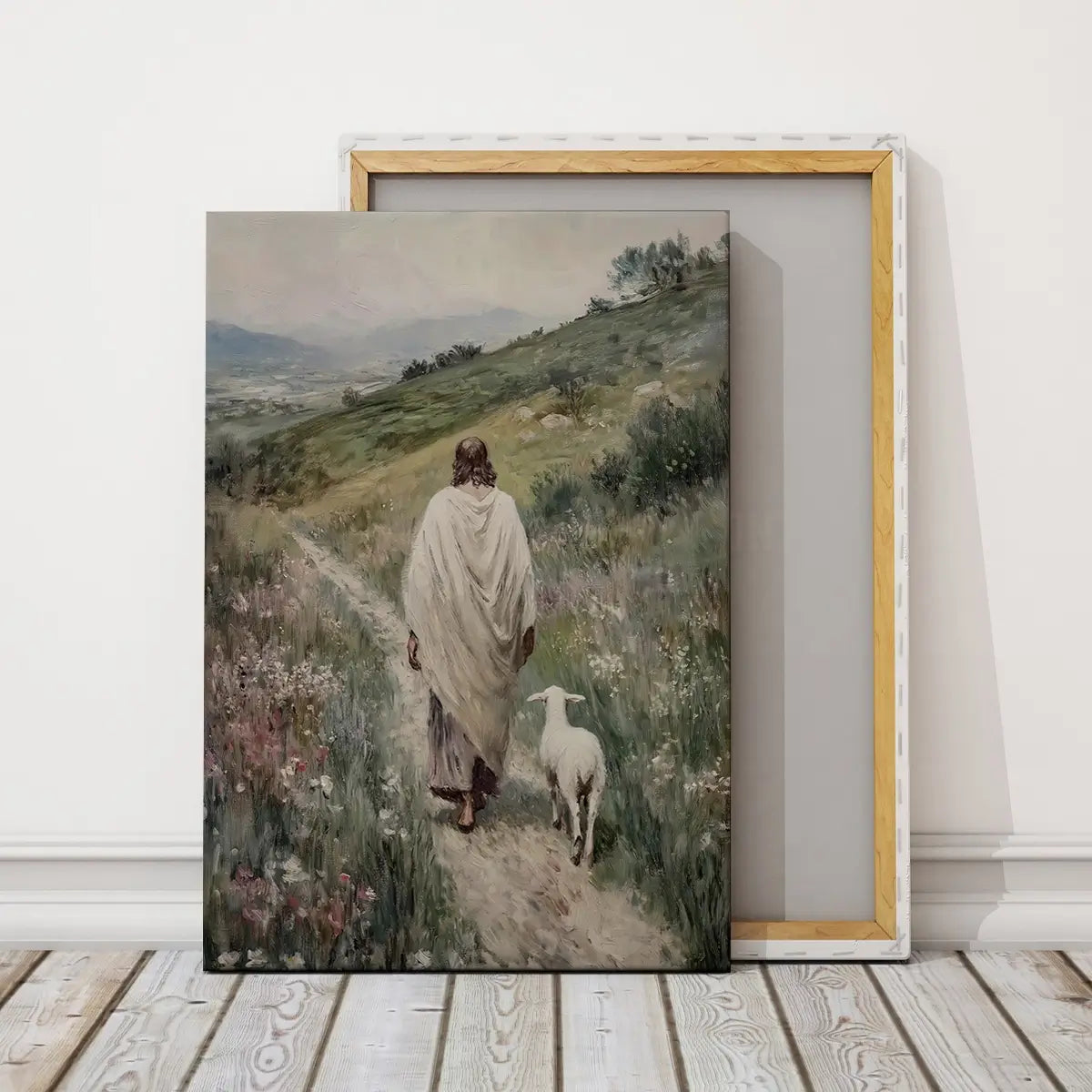 Following the Shepherd Christian canvas art showing Jesus leading a lamb